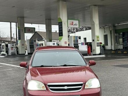 Красный Шевроле Лачетти, объемом двигателя 1.8 л и пробегом 251 тыс. км за 3999 $, фото 1 на Automoto.ua