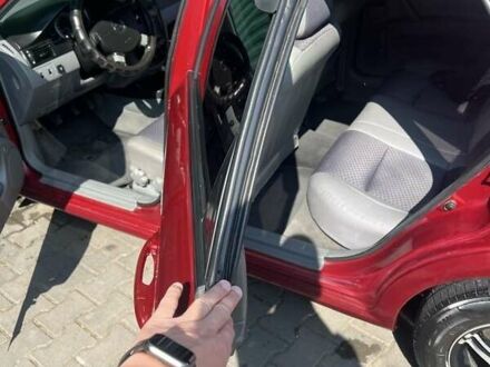 Красный Шевроле Лачетти, объемом двигателя 1.6 л и пробегом 370 тыс. км за 5000 $, фото 1 на Automoto.ua