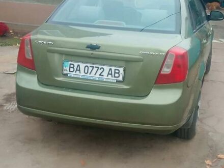 Красный Шевроле Лачетти, объемом двигателя 0.12 л и пробегом 300 тыс. км за 3500 $, фото 1 на Automoto.ua