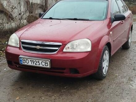 Красный Шевроле Лачетти, объемом двигателя 1.6 л и пробегом 235 тыс. км за 3850 $, фото 1 на Automoto.ua