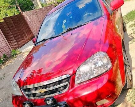 Красный Шевроле Лачетти, объемом двигателя 1.8 л и пробегом 425 тыс. км за 3700 $, фото 1 на Automoto.ua