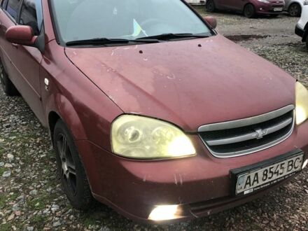 Красный Шевроле Лачетти, объемом двигателя 1.8 л и пробегом 400 тыс. км за 1100 $, фото 1 на Automoto.ua