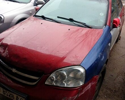 Красный Шевроле Лачетти, объемом двигателя 1.8 л и пробегом 190 тыс. км за 2000 $, фото 1 на Automoto.ua