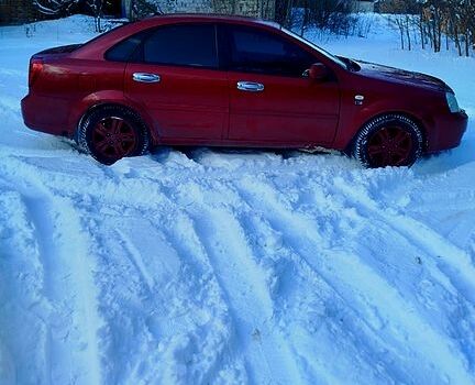 Красный Шевроле Лачетти, объемом двигателя 1.8 л и пробегом 24500 тыс. км за 3900 $, фото 1 на Automoto.ua