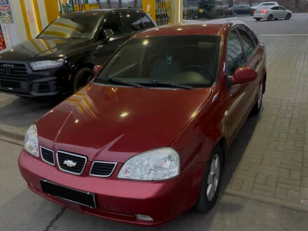 Красный Шевроле Лачетти, объемом двигателя 1.8 л и пробегом 156 тыс. км за 2999 $, фото 1 на Automoto.ua