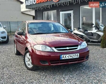Красный Шевроле Лачетти, объемом двигателя 1.4 л и пробегом 200 тыс. км за 3200 $, фото 1 на Automoto.ua