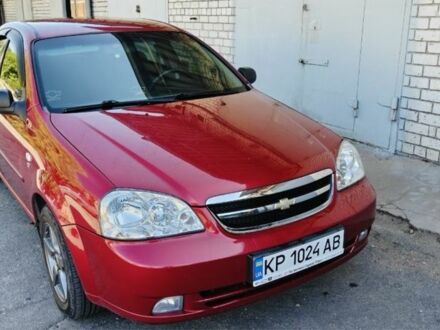 Красный Шевроле Лачетти, объемом двигателя 1.6 л и пробегом 84 тыс. км за 5000 $, фото 1 на Automoto.ua