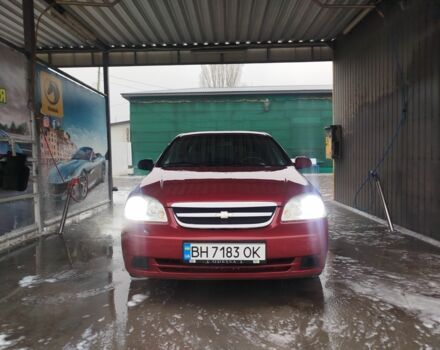 Красный Шевроле Лачетти, объемом двигателя 1.8 л и пробегом 397 тыс. км за 3100 $, фото 1 на Automoto.ua