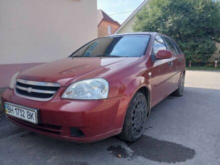 Красный Шевроле Лачетти, объемом двигателя 1.8 л и пробегом 440 тыс. км за 1250 $, фото 1 на Automoto.ua