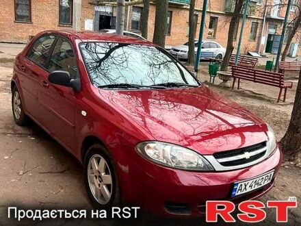 Красный Шевроле Лачетти, объемом двигателя 1.4 л и пробегом 200 тыс. км за 4000 $, фото 1 на Automoto.ua
