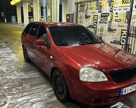 Красный Шевроле Лачетти, объемом двигателя 1.8 л и пробегом 420 тыс. км за 2000 $, фото 1 на Automoto.ua