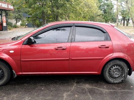 Красный Шевроле Лачетти, объемом двигателя 1.6 л и пробегом 264 тыс. км за 2500 $, фото 1 на Automoto.ua
