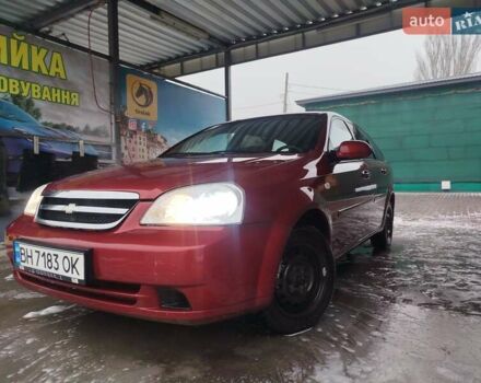 Красный Шевроле Лачетти, объемом двигателя 1.8 л и пробегом 397 тыс. км за 3100 $, фото 1 на Automoto.ua