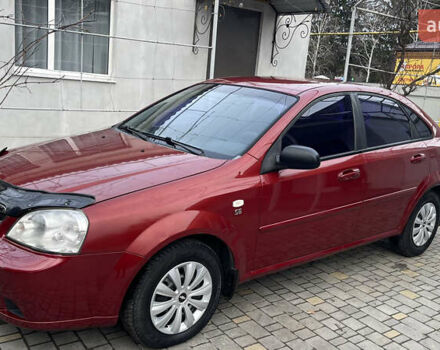 Красный Шевроле Лачетти, объемом двигателя 1.6 л и пробегом 200 тыс. км за 3650 $, фото 1 на Automoto.ua