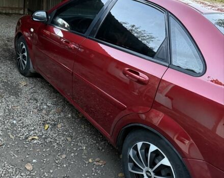 Красный Шевроле Лачетти, объемом двигателя 1.6 л и пробегом 368 тыс. км за 3300 $, фото 1 на Automoto.ua