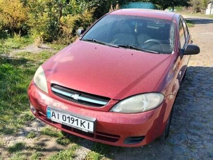Красный Шевроле Лачетти, объемом двигателя 1.6 л и пробегом 303 тыс. км за 3300 $, фото 1 на Automoto.ua