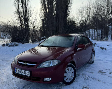 Красный Шевроле Лачетти, объемом двигателя 1.6 л и пробегом 245 тыс. км за 3699 $, фото 1 на Automoto.ua