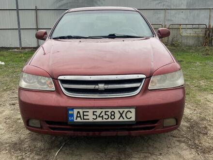 Красный Шевроле Лачетти, объемом двигателя 1.8 л и пробегом 267 тыс. км за 3500 $, фото 1 на Automoto.ua