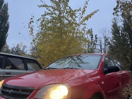 Красный Шевроле Лачетти, объемом двигателя 1.6 л и пробегом 287 тыс. км за 2300 $, фото 1 на Automoto.ua