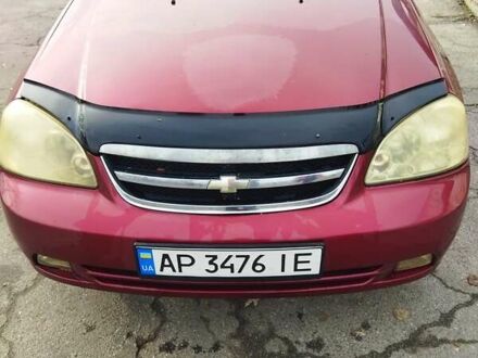 Красный Шевроле Лачетти, объемом двигателя 1.8 л и пробегом 313 тыс. км за 4500 $, фото 1 на Automoto.ua