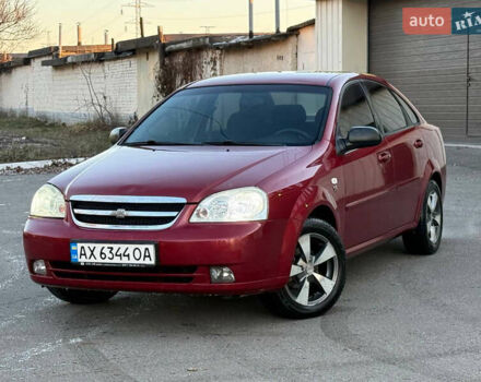 Красный Шевроле Лачетти, объемом двигателя 1.6 л и пробегом 243 тыс. км за 3950 $, фото 1 на Automoto.ua