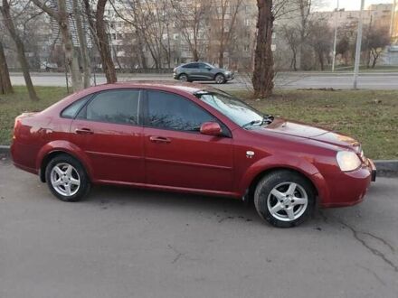 Красный Шевроле Лачетти, объемом двигателя 1.8 л и пробегом 281 тыс. км за 3600 $, фото 1 на Automoto.ua