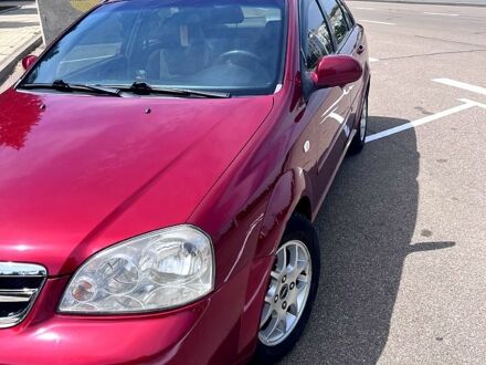 Червоний Шевроле Лачетті, об'ємом двигуна 1.8 л та пробігом 205 тис. км за 4650 $, фото 1 на Automoto.ua