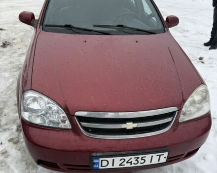 Красный Шевроле Лачетти, объемом двигателя 1.8 л и пробегом 330 тыс. км за 3300 $, фото 1 на Automoto.ua