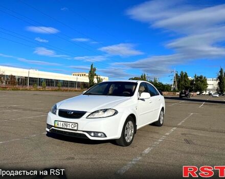 Червоний Шевроле Лачетті, об'ємом двигуна 1.8 л та пробігом 202 тис. км за 3899 $, фото 1 на Automoto.ua