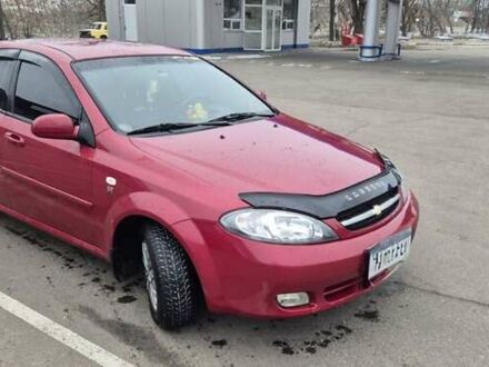 Красный Шевроле Лачетти, объемом двигателя 1.6 л и пробегом 156 тыс. км за 5400 $, фото 1 на Automoto.ua