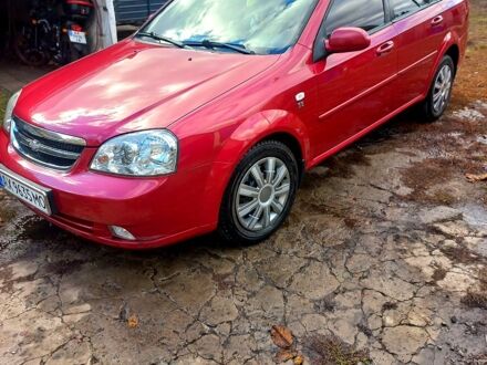 Красный Шевроле Лачетти, объемом двигателя 1.6 л и пробегом 180 тыс. км за 5600 $, фото 1 на Automoto.ua