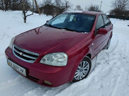 Красный Шевроле Лачетти, объемом двигателя 1.8 л и пробегом 163 тыс. км за 4500 $, фото 1 на Automoto.ua