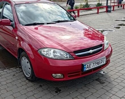 Красный Шевроле Лачетти, объемом двигателя 1.6 л и пробегом 133 тыс. км за 5000 $, фото 1 на Automoto.ua