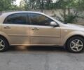 Желтый Шевроле Лачетти, объемом двигателя 1.4 л и пробегом 395 тыс. км за 3499 $, фото 2 на Automoto.ua