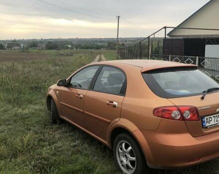Желтый Шевроле Лачетти, объемом двигателя 1.8 л и пробегом 100 тыс. км за 4300 $, фото 10 на Automoto.ua