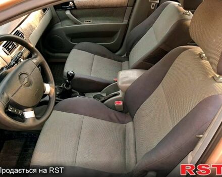 Желтый Шевроле Лачетти, объемом двигателя 1.8 л и пробегом 200 тыс. км за 2300 $, фото 1 на Automoto.ua