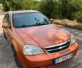 Желтый Шевроле Лачетти, объемом двигателя 1.8 л и пробегом 235 тыс. км за 3700 $, фото 1 на Automoto.ua