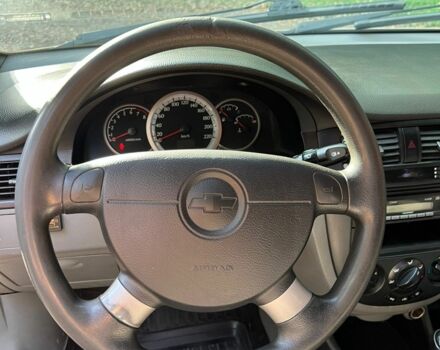 Желтый Шевроле Лачетти, объемом двигателя 1.4 л и пробегом 187 тыс. км за 4200 $, фото 11 на Automoto.ua