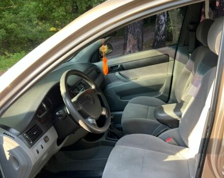 Желтый Шевроле Лачетти, объемом двигателя 1.4 л и пробегом 187 тыс. км за 4200 $, фото 12 на Automoto.ua