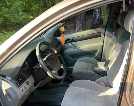 Желтый Шевроле Лачетти, объемом двигателя 1.4 л и пробегом 187 тыс. км за 4200 $, фото 11 на Automoto.ua