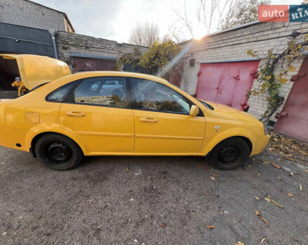 Желтый Шевроле Лачетти, объемом двигателя 1.6 л и пробегом 200 тыс. км за 4200 $, фото 2 на Automoto.ua