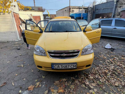 Желтый Шевроле Лачетти, объемом двигателя 1.6 л и пробегом 200 тыс. км за 4200 $, фото 1 на Automoto.ua