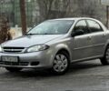 Серый Шевроле Лачетти, объемом двигателя 1.4 л и пробегом 253 тыс. км за 2999 $, фото 1 на Automoto.ua