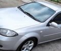 Серый Шевроле Лачетти, объемом двигателя 1.82 л и пробегом 187 тыс. км за 5000 $, фото 1 на Automoto.ua