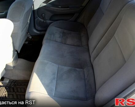 Серый Шевроле Лачетти, объемом двигателя 1.8 л и пробегом 215 тыс. км за 3750 $, фото 10 на Automoto.ua