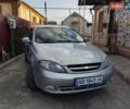 Серый Шевроле Лачетти, объемом двигателя 1.6 л и пробегом 240 тыс. км за 2999 $, фото 1 на Automoto.ua