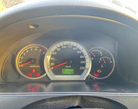 Серый Шевроле Лачетти, объемом двигателя 1.6 л и пробегом 344 тыс. км за 3800 $, фото 4 на Automoto.ua