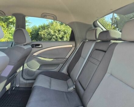 Серый Шевроле Лачетти, объемом двигателя 1.8 л и пробегом 205 тыс. км за 5199 $, фото 11 на Automoto.ua