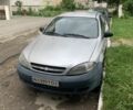 Серый Шевроле Лачетти, объемом двигателя 1.6 л и пробегом 170 тыс. км за 1999 $, фото 1 на Automoto.ua