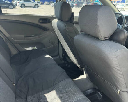 Серый Шевроле Лачетти, объемом двигателя 1.6 л и пробегом 283 тыс. км за 4750 $, фото 9 на Automoto.ua